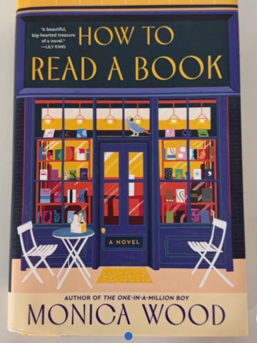 Monica Wood "How to Read a Book" — Navy & Yellow Hardcover Novel